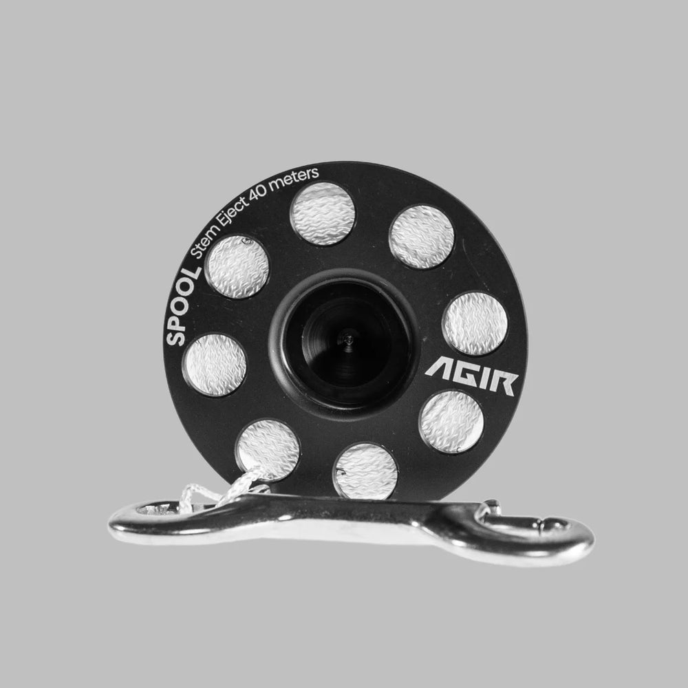 Black spool with silver accents and 'AGIR' branding on a gray background