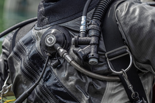 Diver wearing Ammonite thermovalve on drysuit