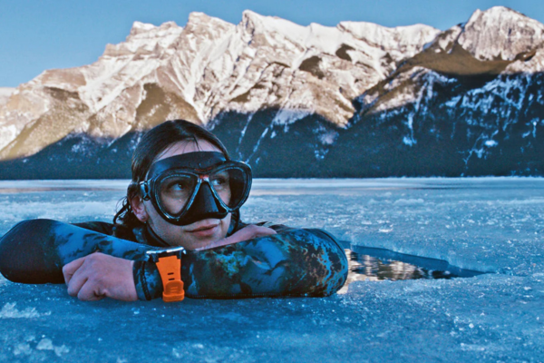 Female Freediver wearing Shearwater computer