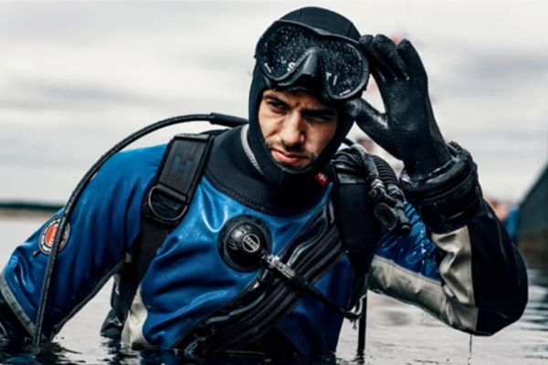 Male diver wearing a Santi drysuit