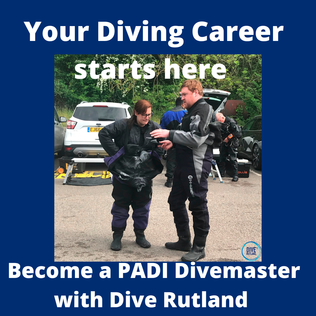 Divemaster showing student how to use compass | Dive Rutland